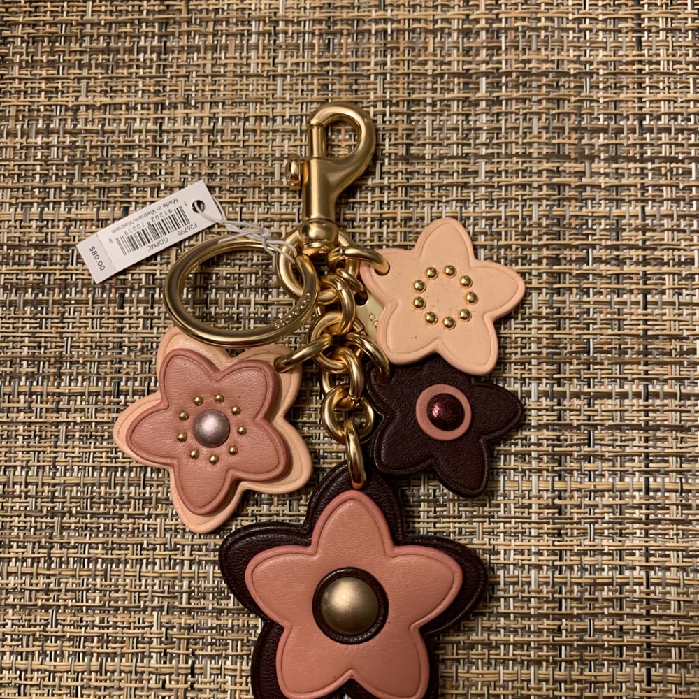 Coach flowers charm
